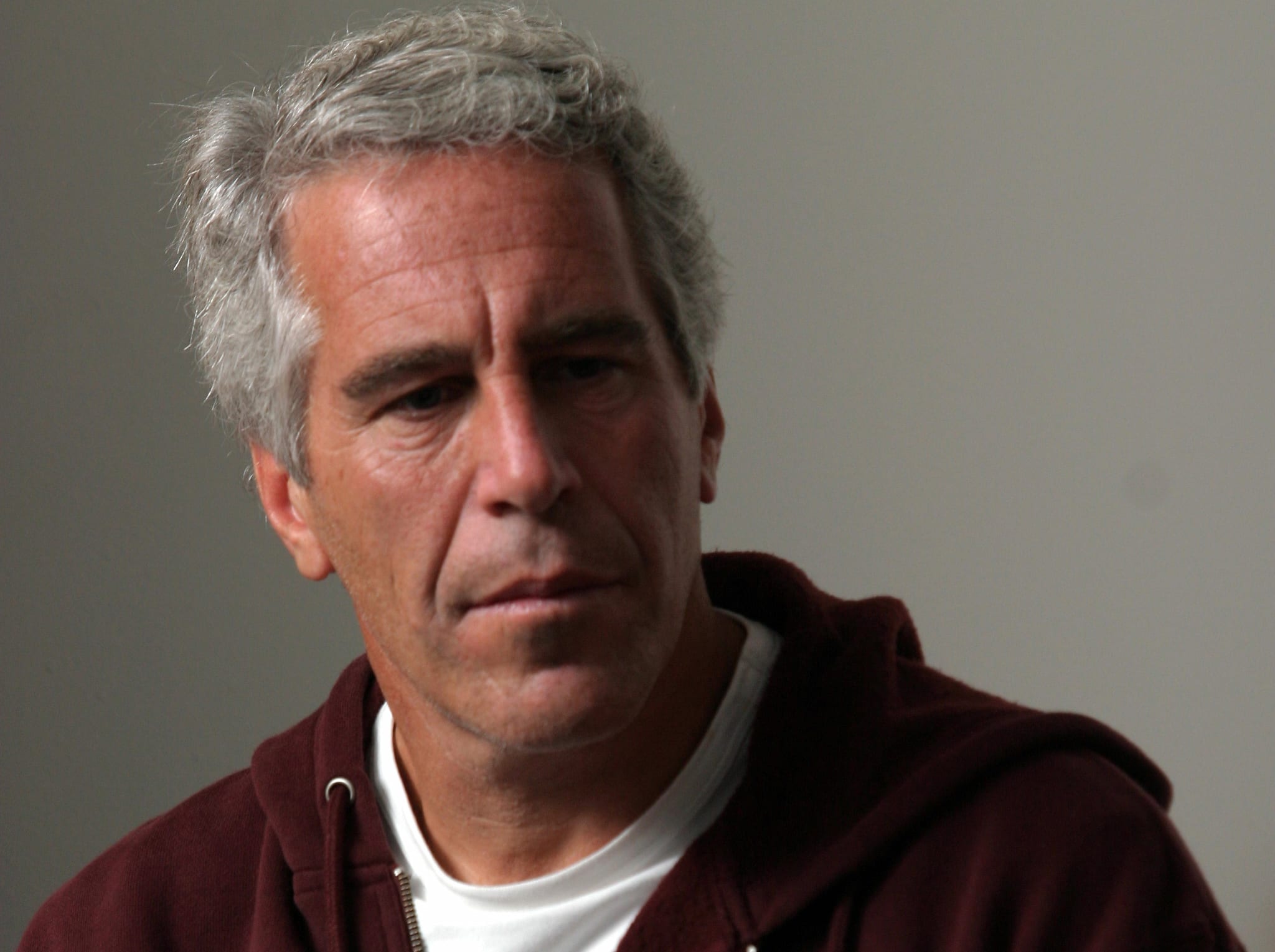 Jeffrey Epstein: prison guards charged with hiding failure to keep watch